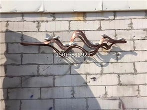 匠心雕琢 售樓部戶外不銹鋼藝術(shù)背景墻，激光圍邊與手工鍛造的藝術(shù)對(duì)話